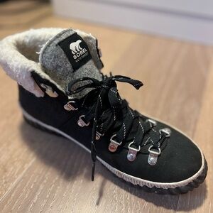 Sorel Booties. Be that edgy elf. Toasty fleece. Tough rubber. Hip hardware.
